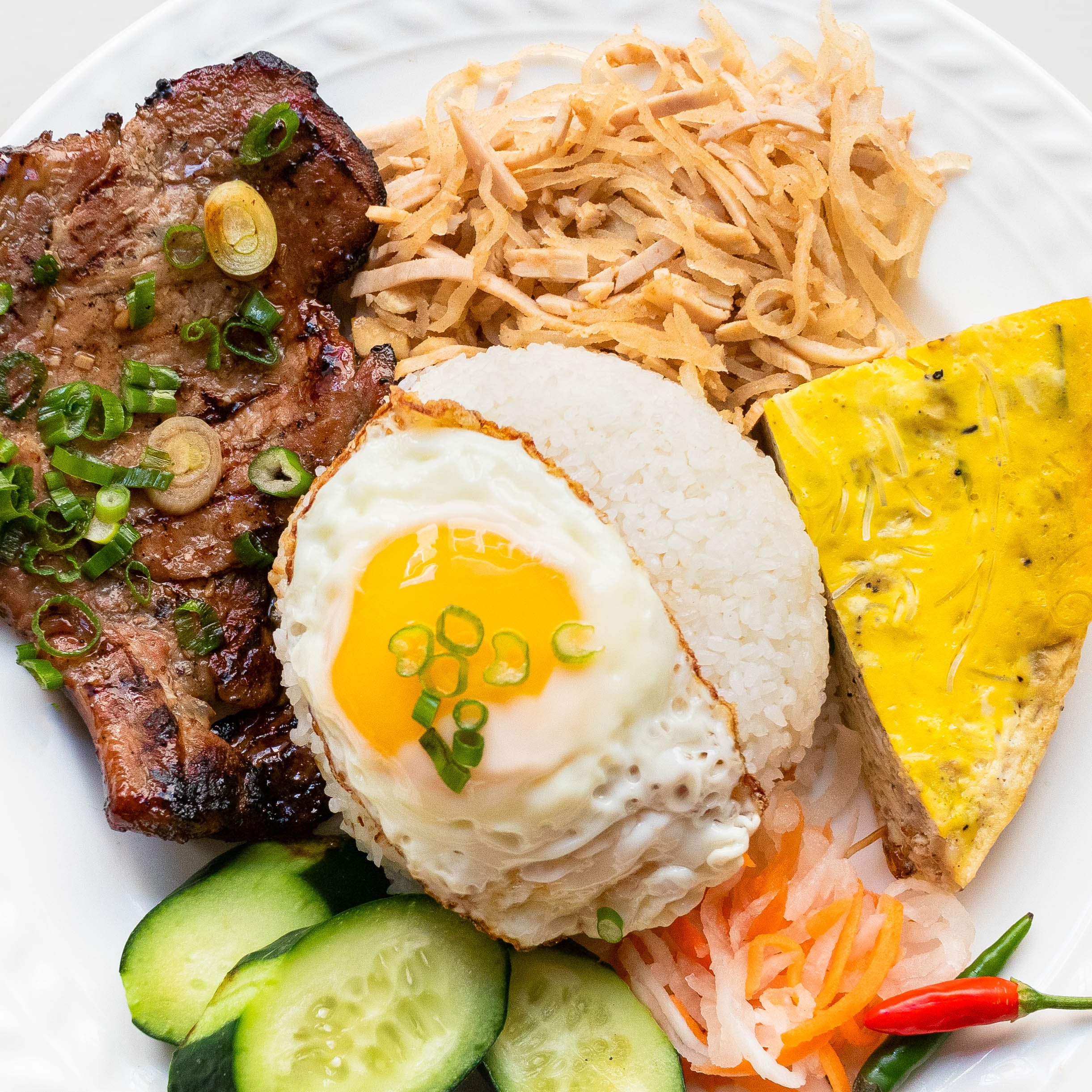 Com Tam: Vietnam’s Broken Rice with Savory Toppings